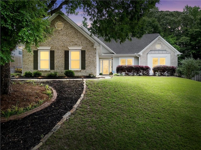 3320 Goldmist Dr, Buford, GA 30519 - view of front of house with brick siding and a yard