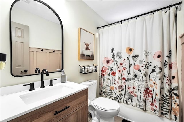 3320 Goldmist Dr, Buford, GA 30519 - bathroom featuring toilet, vanity, and shower / tub combo