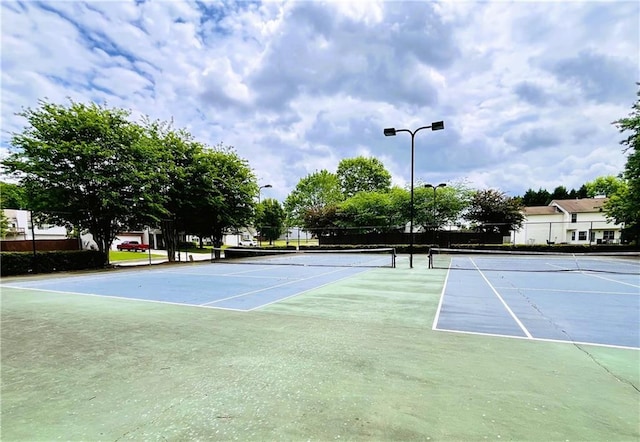 1528 Buckingham Pl, Stockbridge, GA 30281 - view of tennis court with community basketball court and fence