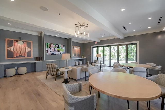 dining space with light wood-style floors, recessed lighting, beam ceiling, and visible vents