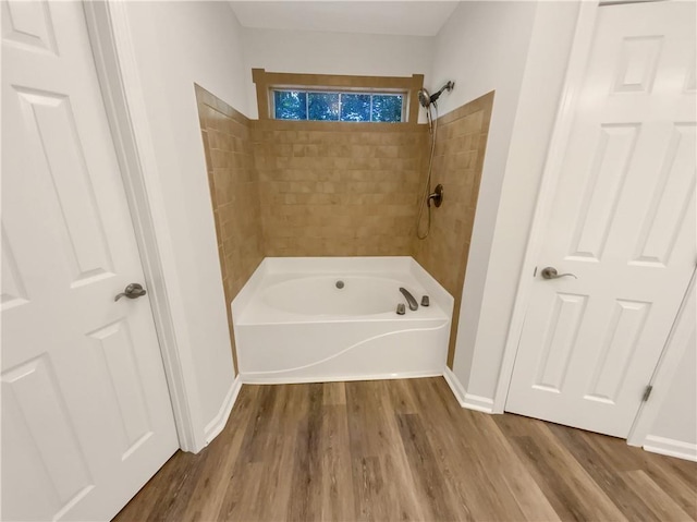 131 Morningside Dr, Jackson, GA 30233 - full bathroom featuring wood finished floors and shower / bath combination