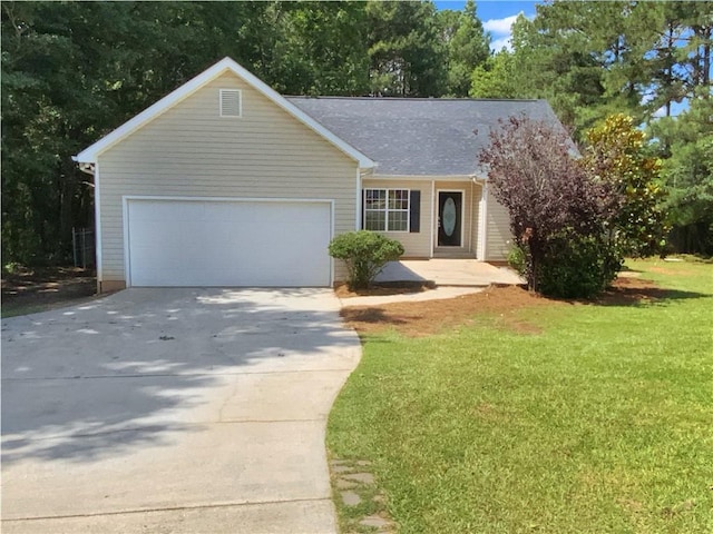 131 Morningside Dr, Jackson, GA 30233 - single story home with driveway, an attached garage, and a front yard