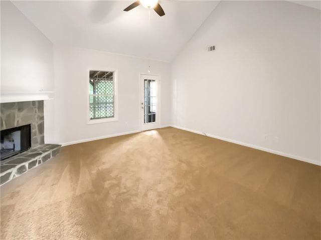 131 Morningside Dr, Jackson, GA 30233 - unfurnished living room with a ceiling fan, carpet flooring, a fireplace, and high vaulted ceiling