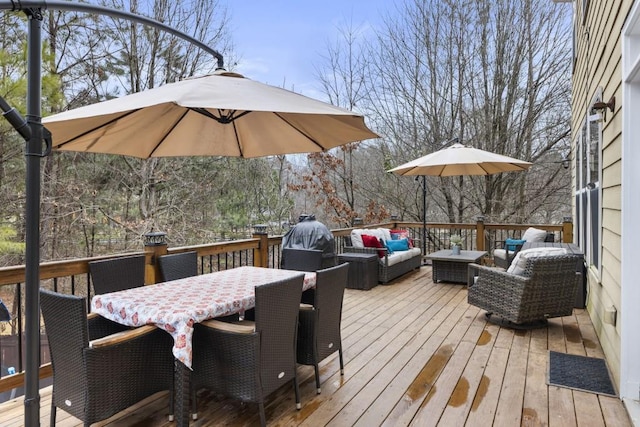 wooden deck featuring outdoor dining space and an outdoor living space