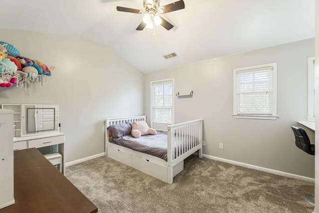 bedroom featuring baseboards, visible vents, a ceiling fan, vaulted ceiling, and carpet floors