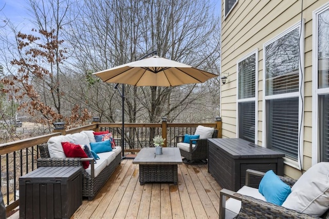 wooden deck with an outdoor living space