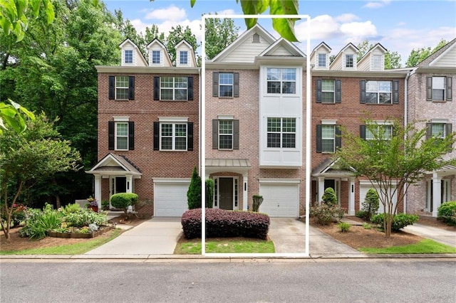 651 Coligny Ct, Atlanta, GA 30350 - townhome / multi-family property featuring brick siding, driveway, and an attached garage