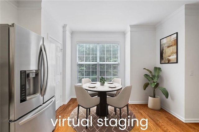 651 Coligny Ct, Atlanta, GA 30350 - dining room with wood finished floors and crown molding