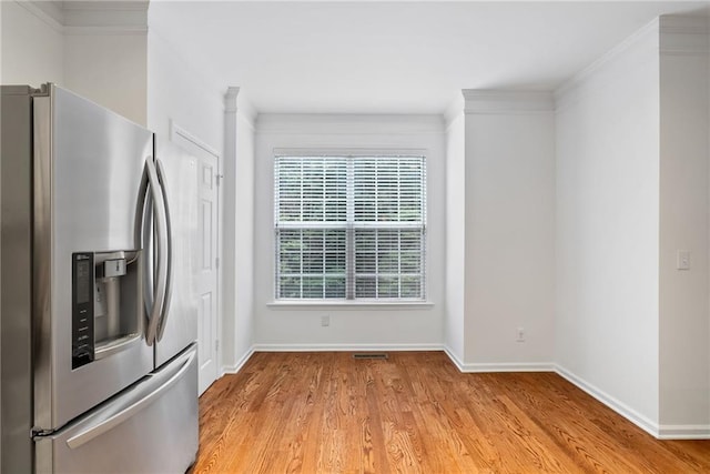 651 Coligny Ct, Atlanta, GA 30350 - kitchen featuring stainless steel fridge with ice dispenser and light wood finished floors