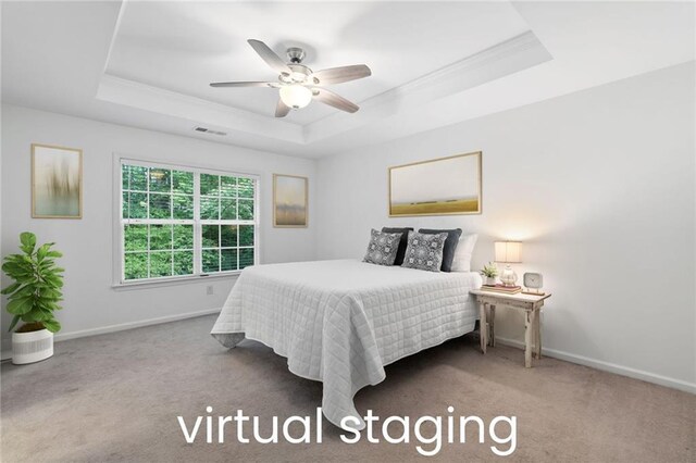 651 Coligny Ct, Atlanta, GA 30350 - carpeted bedroom featuring a raised ceiling, crown molding, and ceiling fan
