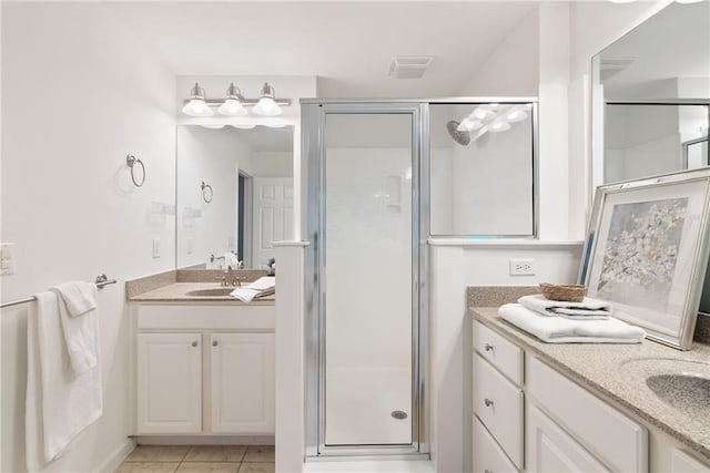 651 Coligny Ct, Atlanta, GA 30350 - bathroom featuring a shower stall, vanity, and tile patterned flooring