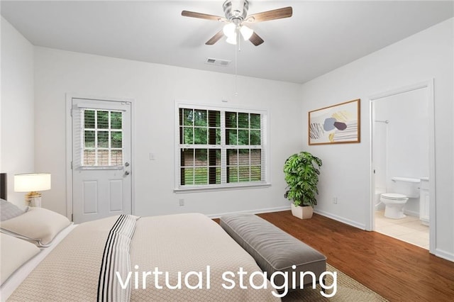 651 Coligny Ct, Atlanta, GA 30350 - bedroom with wood finished floors, ensuite bath, and a ceiling fan