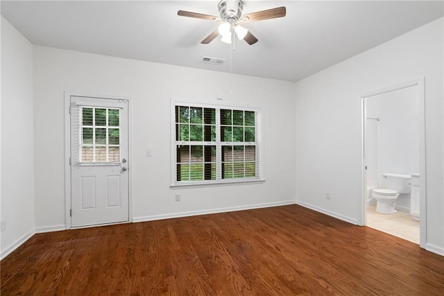 651 Coligny Ct, Atlanta, GA 30350 - empty room with wood finished floors and ceiling fan