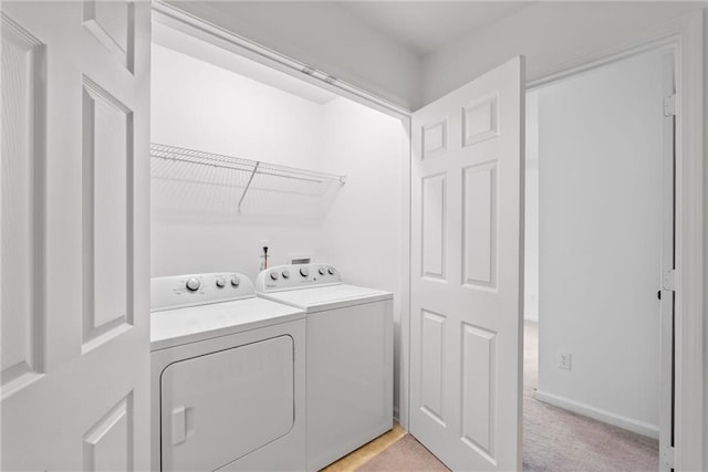 651 Coligny Ct, Atlanta, GA 30350 - laundry room featuring independent washer and dryer and light carpet