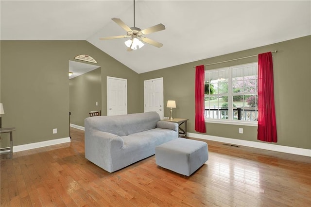 192 Aubrey Ave NE, Calhoun, GA 30701 - living area featuring visible vents, baseboards, a ceiling fan, hardwood / wood-style floors, and vaulted ceiling