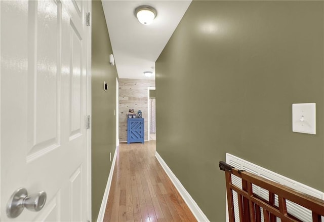 192 Aubrey Ave NE, Calhoun, GA 30701 - corridor with wood-type flooring, wood walls, and baseboards