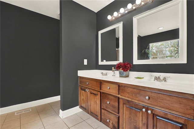 192 Aubrey Ave NE, Calhoun, GA 30701 - full bathroom featuring tile patterned floors, a sink, baseboards, visible vents, and double vanity