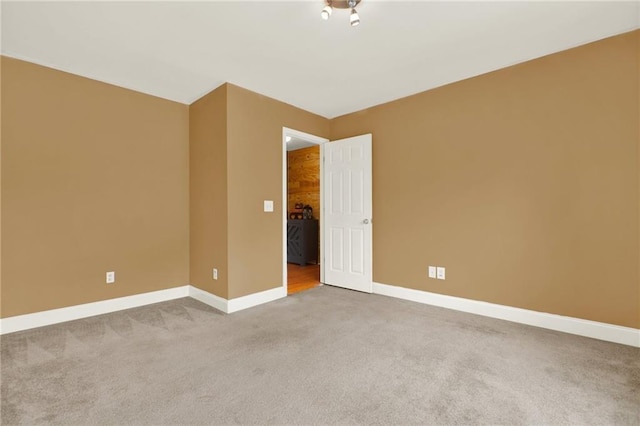 192 Aubrey Ave NE, Calhoun, GA 30701 - carpeted empty room featuring baseboards