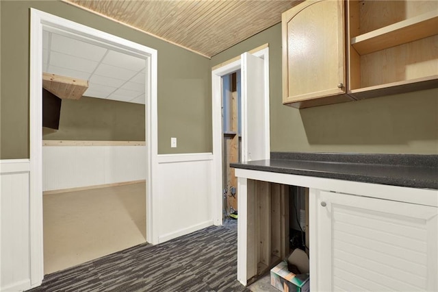 192 Aubrey Ave NE, Calhoun, GA 30701 - kitchen with a wainscoted wall, wooden ceiling, open shelves, dark countertops, and a drop ceiling