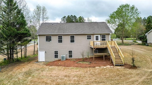 192 Aubrey Ave NE, Calhoun, GA 30701 - back of property with a shingled roof, central AC unit, stairs, and a wooden deck