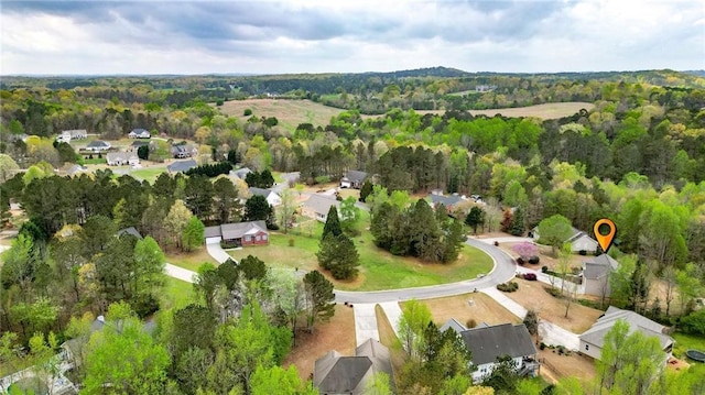192 Aubrey Ave NE, Calhoun, GA 30701 - drone / aerial view with a wooded view