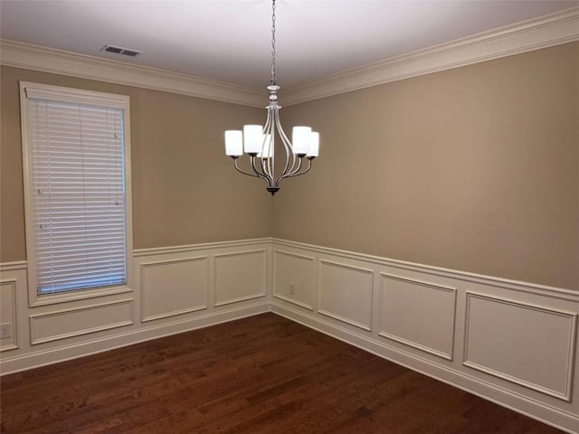 3622 Foxtrot Trl NW, Kennesaw, GA 30144 - spare room with a chandelier, dark wood-style flooring, ornamental molding, a wainscoted wall, and a decorative wall