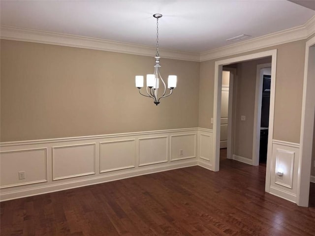 3622 Foxtrot Trl NW, Kennesaw, GA 30144 - unfurnished room with a chandelier, crown molding, a decorative wall, dark wood-style flooring, and a wainscoted wall