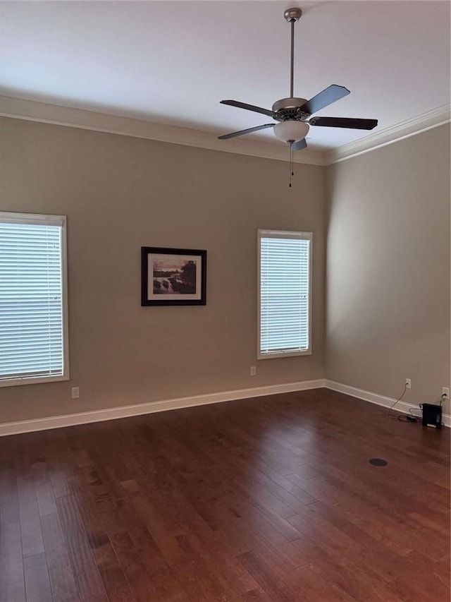 3622 Foxtrot Trl NW, Kennesaw, GA 30144 - spare room with crown molding, a ceiling fan, dark wood-style flooring, and baseboards