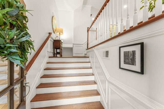 1227 Parkside Village Dr NW, Marietta, GA 30060 - staircase featuring a decorative wall and a towering ceiling
