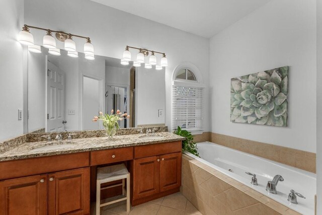 1227 Parkside Village Dr NW, Marietta, GA 30060 - bathroom with double vanity, a jetted tub, and tile patterned flooring
