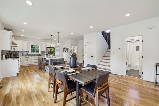 dining space featuring light hardwood / wood-style floors