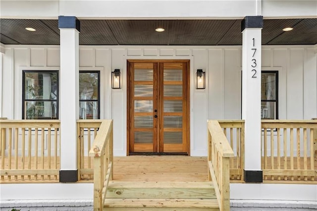 doorway to property featuring a porch