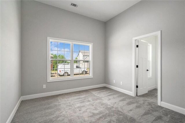 view of carpeted spare room