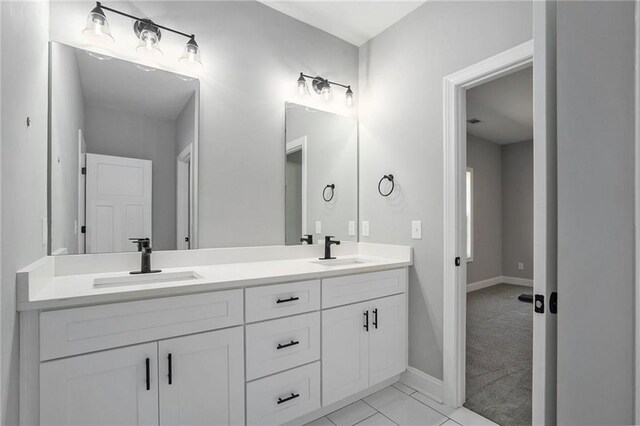 bathroom featuring tile patterned floors and vanity