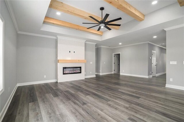 unfurnished living room with ceiling fan, a fireplace, and ornamental molding