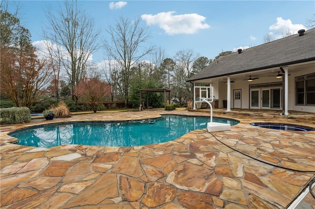 view of swimming pool with a pergola, a patio, ceiling fan, and an in ground hot tub