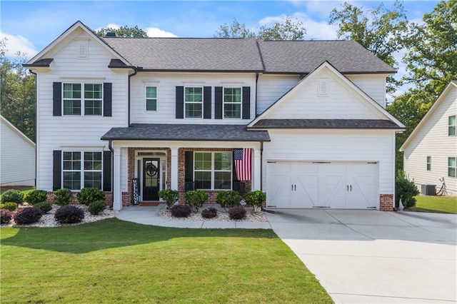 view of front of house with covered porch, central AC, a front lawn, and a garage