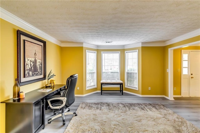 office space featuring dark hardwood / wood-style flooring, a textured ceiling, and ornamental molding