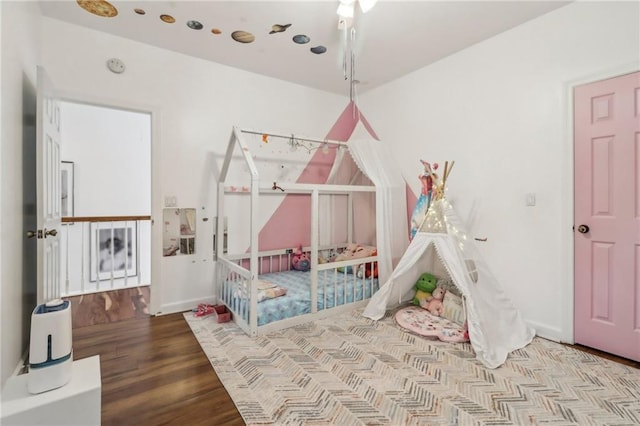 bedroom with light hardwood / wood-style flooring