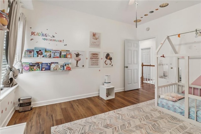 bedroom with wood-type flooring