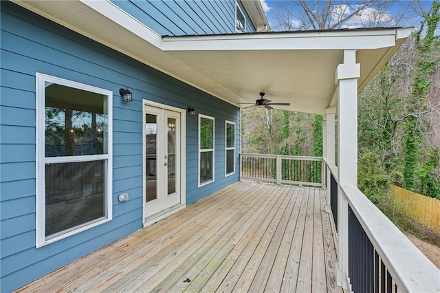 deck featuring french doors and ceiling fan