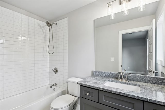 full bath with vanity, toilet, and tub / shower combination