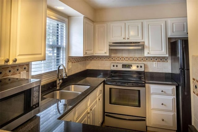 177 NW Amherst Pl, Atlanta, GA 30327 - kitchen with a sink, tasteful backsplash, appliances with stainless steel finishes, and under cabinet range hood