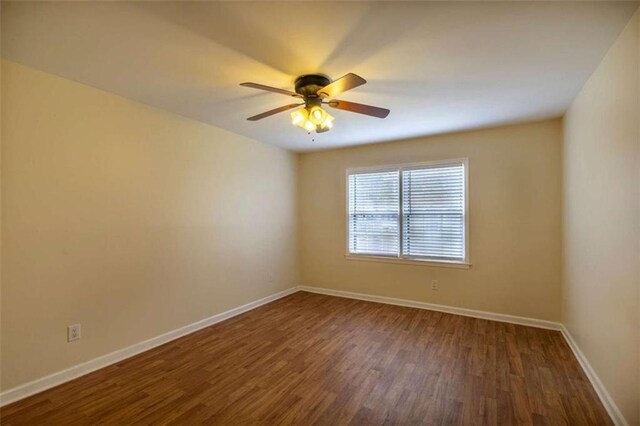 177 NW Amherst Pl, Atlanta, GA 30327 - spare room featuring baseboards, wood finished floors, and a ceiling fan