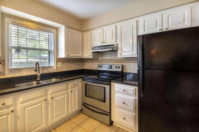 177 NW Amherst Pl, Atlanta, GA 30327 - kitchen with a sink, freestanding refrigerator, tasteful backsplash, under cabinet range hood, and stainless steel electric range oven