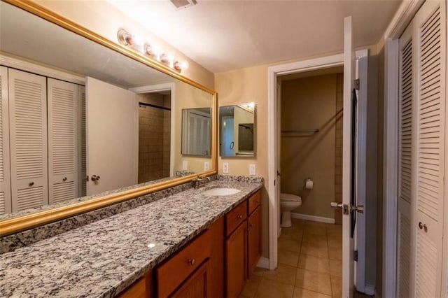 177 NW Amherst Pl, Atlanta, GA 30327 - full bath with tile patterned floors, a closet, toilet, and baseboards