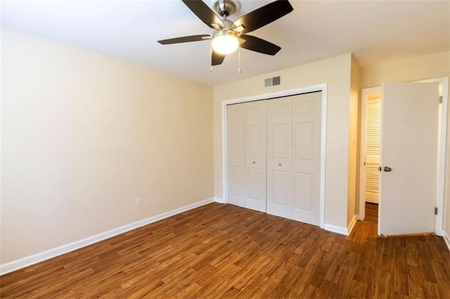 177 NW Amherst Pl, Atlanta, GA 30327 - unfurnished bedroom with baseboards, ceiling fan, visible vents, a closet, and wood finished floors