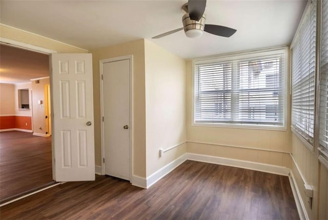 177 NW Amherst Pl, Atlanta, GA 30327 - unfurnished room featuring a ceiling fan, dark wood-type flooring, and baseboards