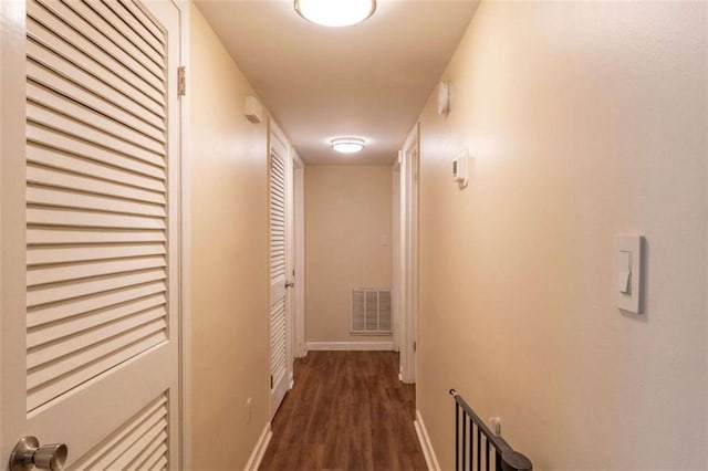 177 NW Amherst Pl, Atlanta, GA 30327 - hall with baseboards, visible vents, and wood finished floors