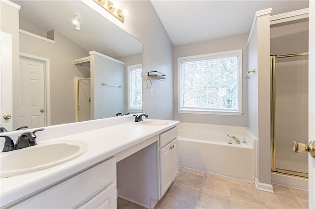 bathroom featuring tile patterned flooring, shower with separate bathtub, vanity, and lofted ceiling